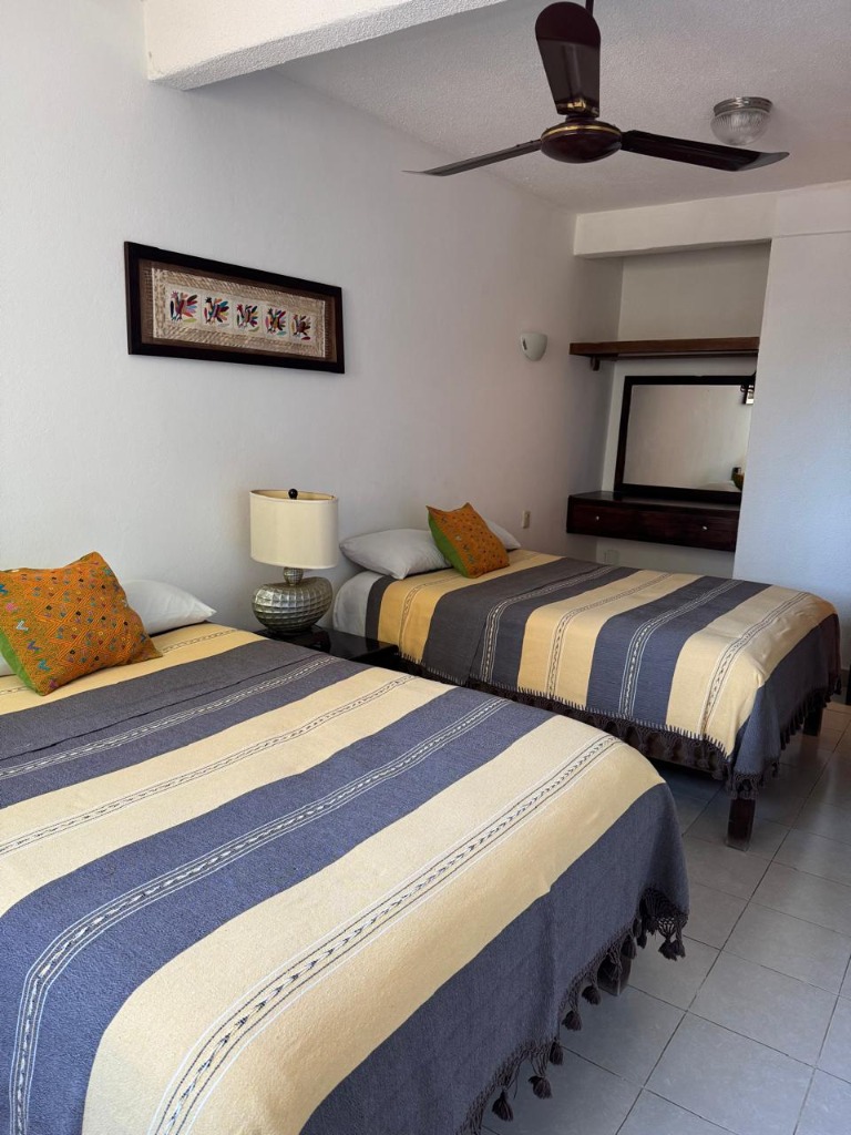 Habitación con Dos Camas Dobles